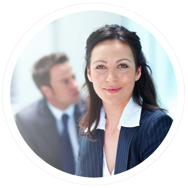 Woman portrait, wearing a blazer, in a business meeting